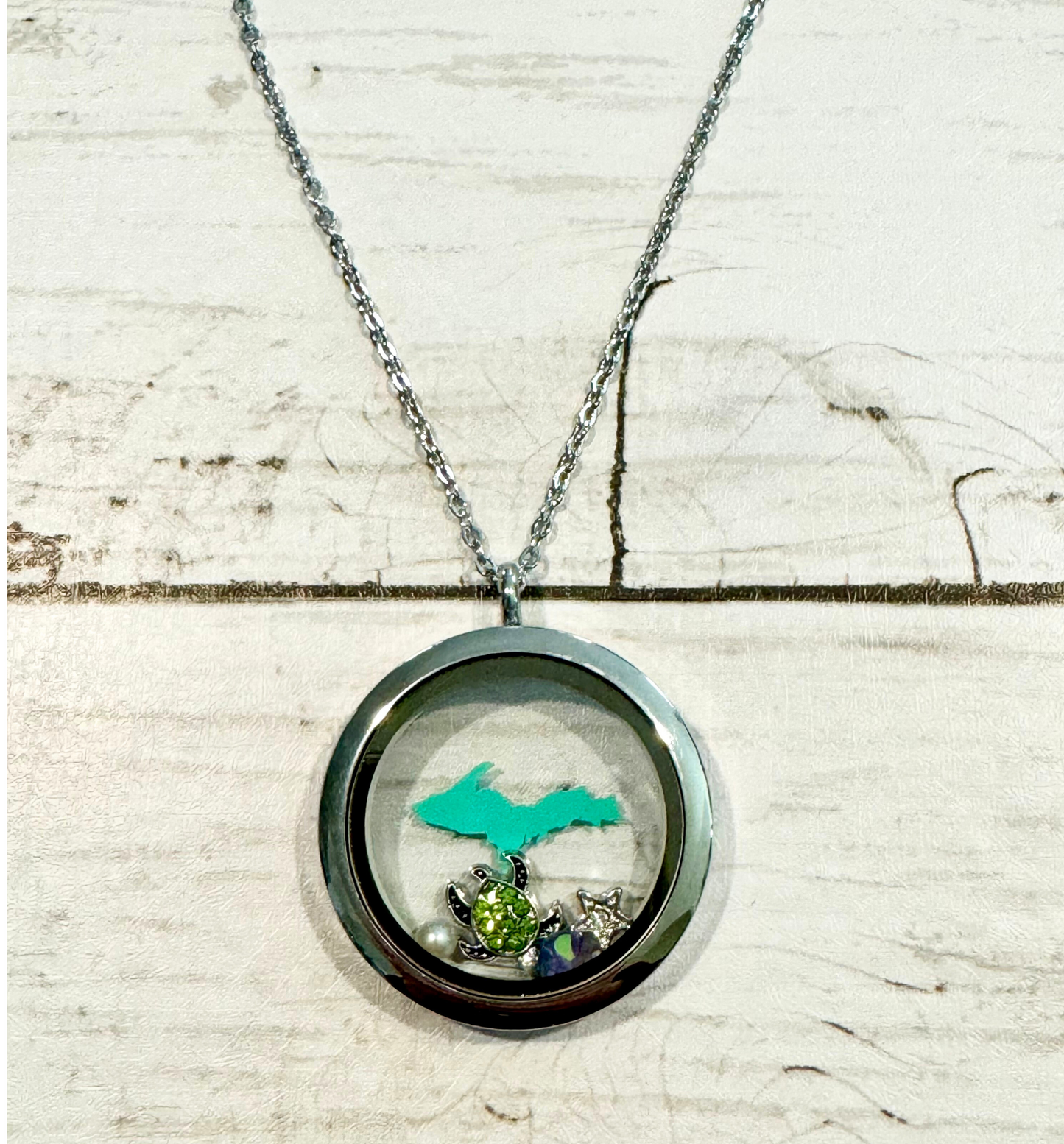 U.P. Stainless Steel Teal Locket With Metal Charms