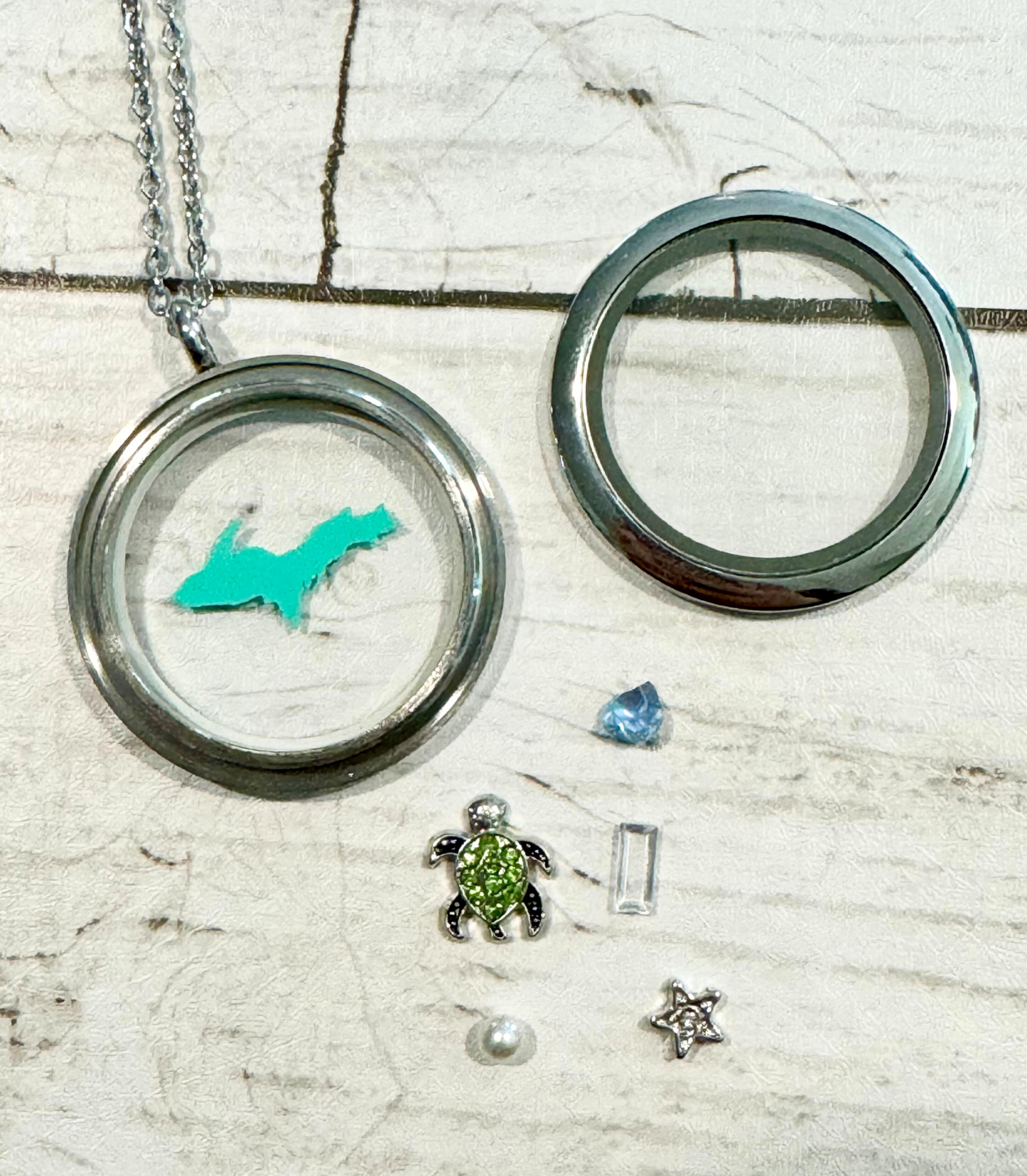 U.P. Stainless Steel Teal Locket With Metal Charms