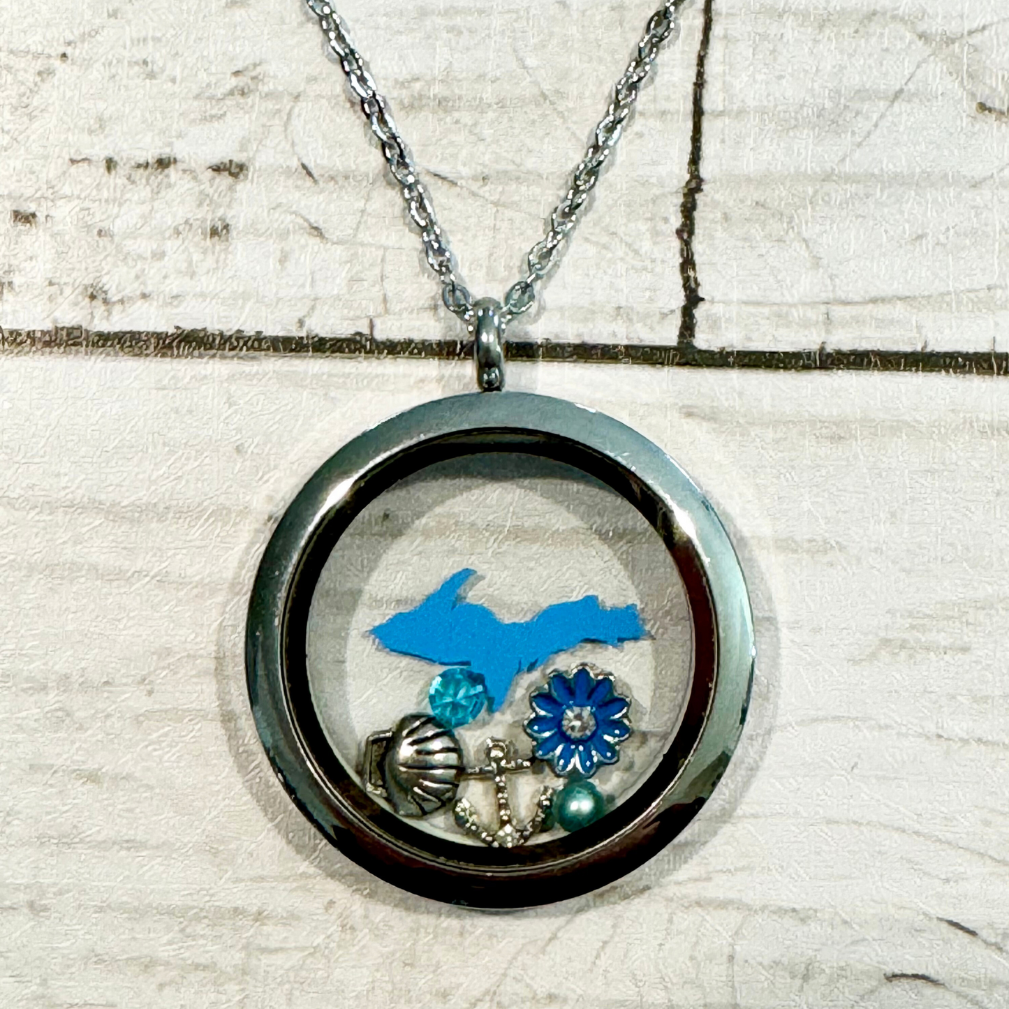 U.P. Stainless Steel Blue Locket With Metal Charms