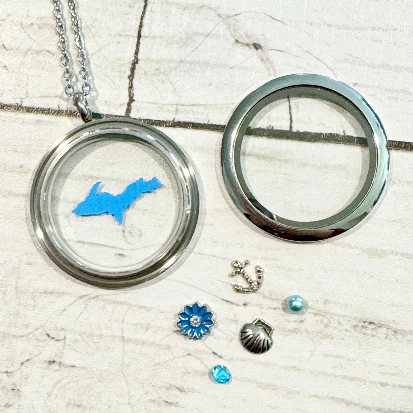 U.P. Stainless Steel Blue Locket With Metal Charms