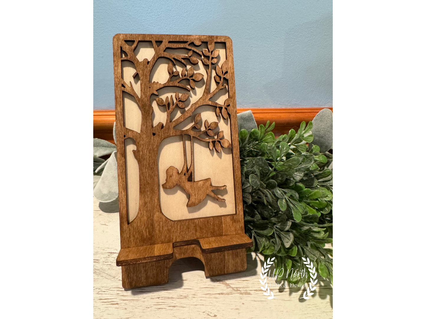 Swinging Girl Wooden Phone Stand